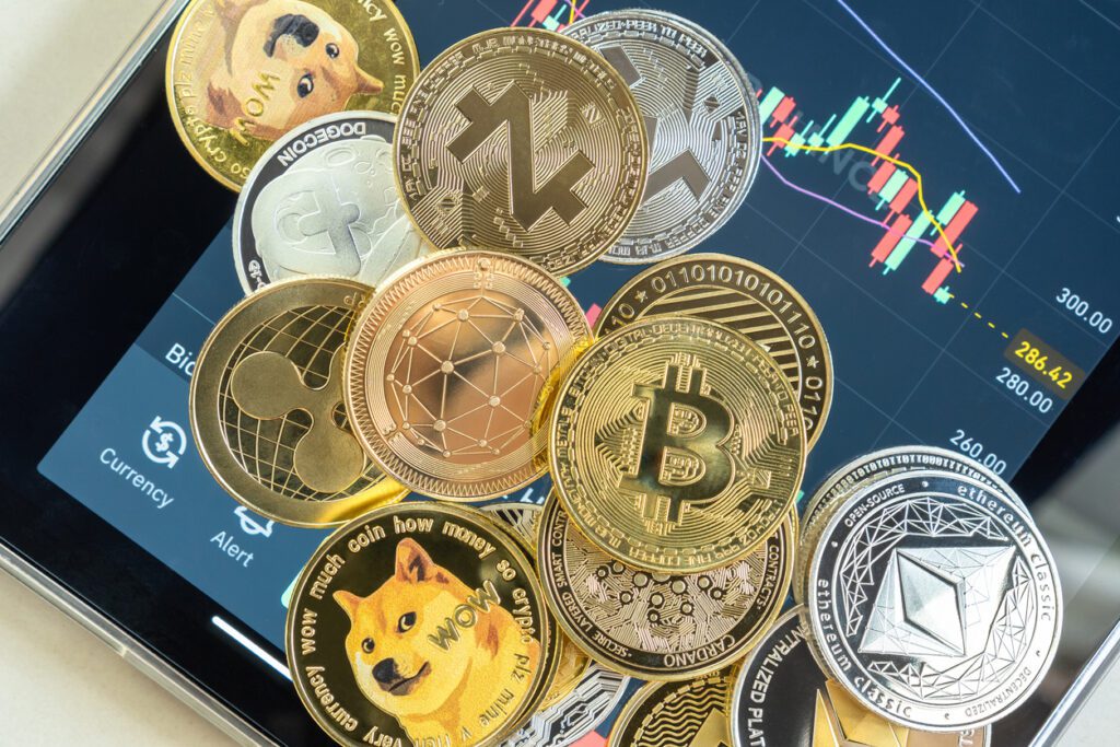 Cryptocurrency Coins Displayed On Smartphone Trading App.jpg